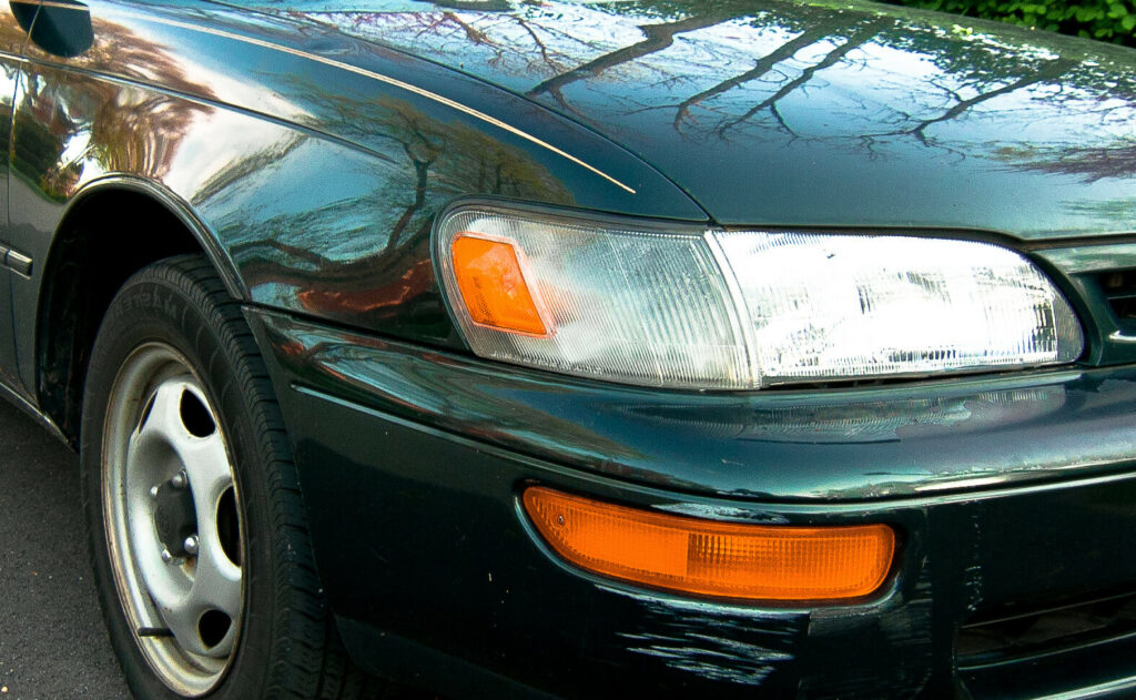 scuffed bumper on car