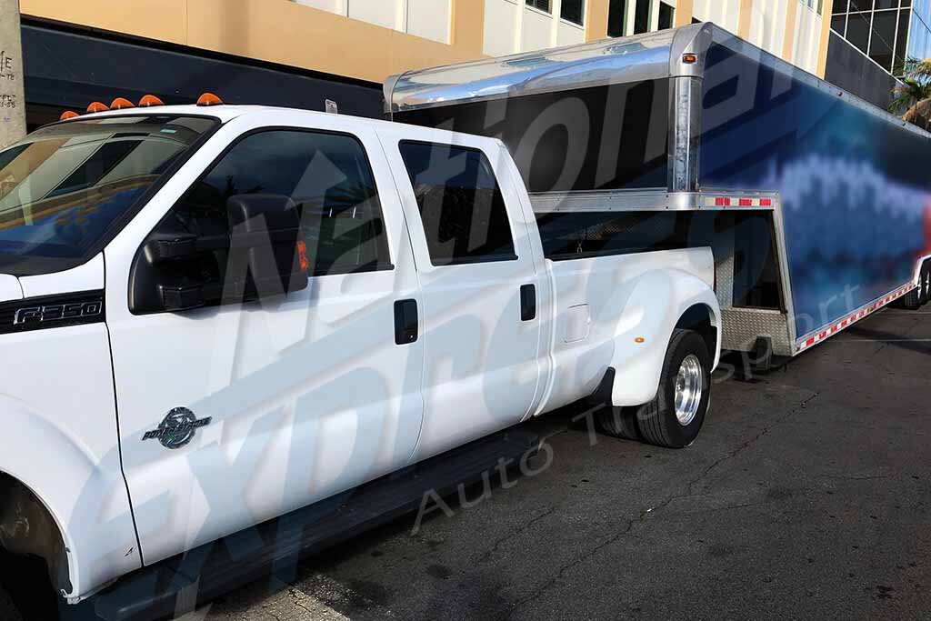 enclosed car trailer pulled by dually truck